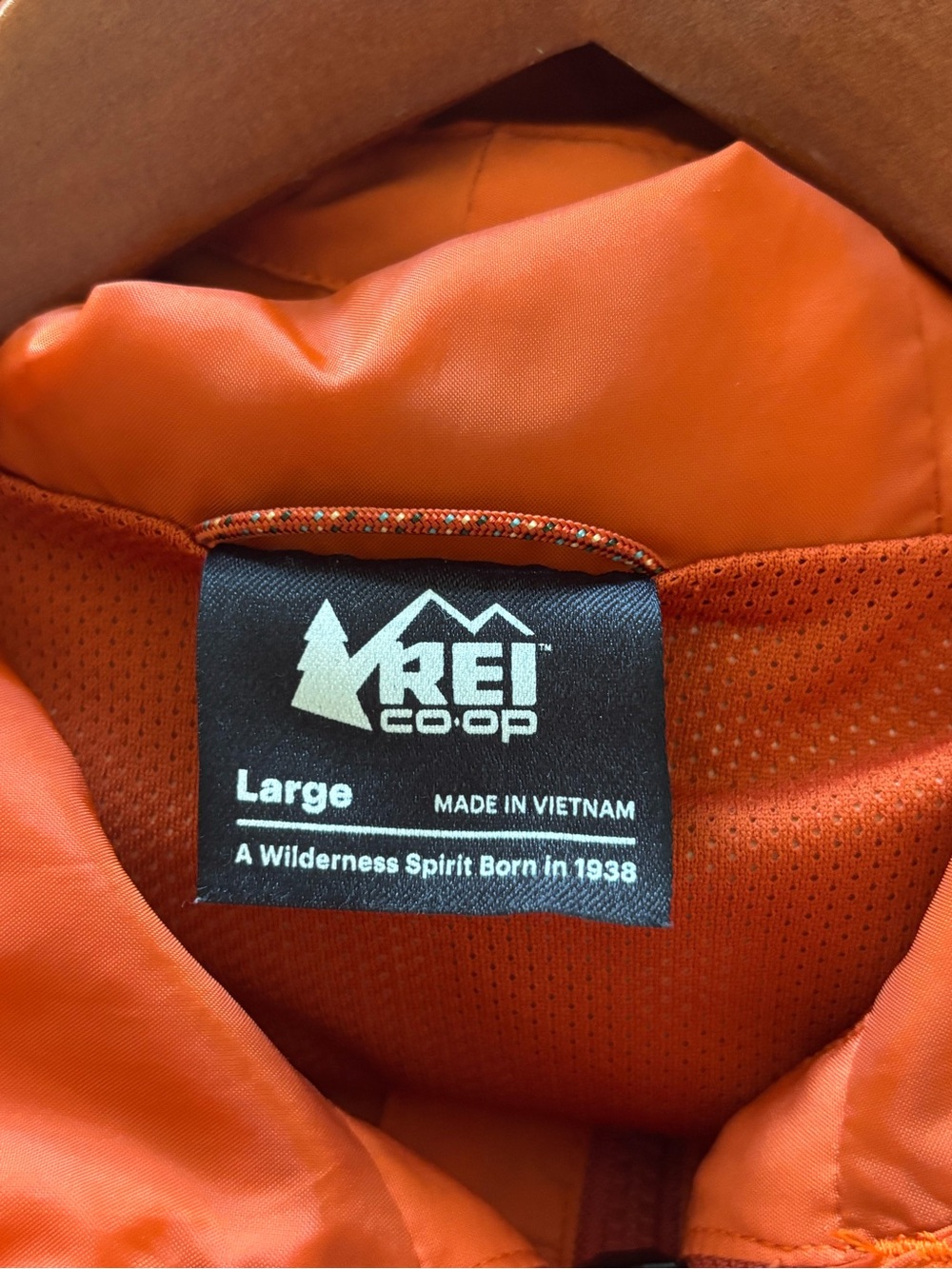 REI Orange Hooded Rain Jacket - Picture 2 of 6